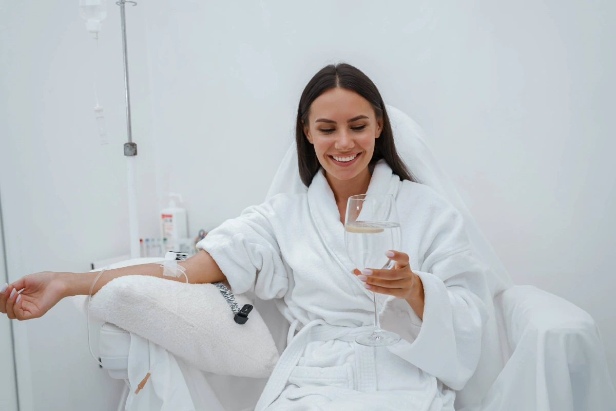 Woman receiving medical-grade infusion treatment in Morristown, TN while relaxing in a wellness clinic.